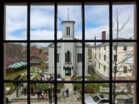 City officials were on hand for the official groundbreaking of the Seamen's Bethel connector to the Mariners Home next door on Johnycake Hill in downtown New Bedford as seen throught window of the Whaling Museum across the street on May 6, 2016.